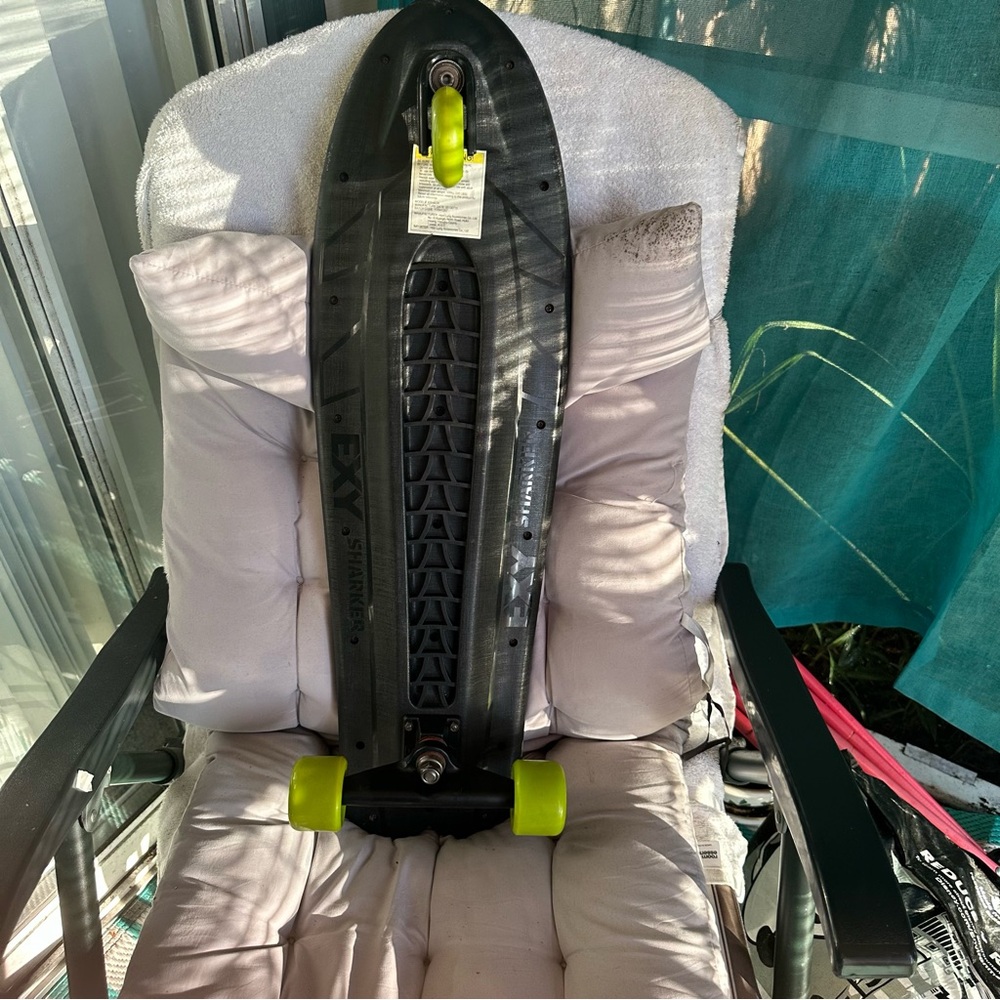 Black Skateboard with Neon Green Wheels